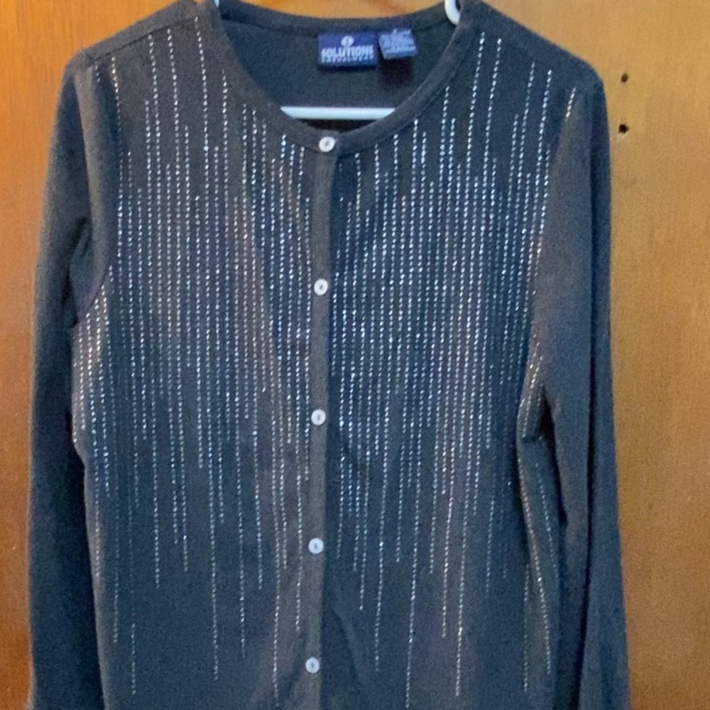 Women’s sweater size small by Solutions Causalwear.